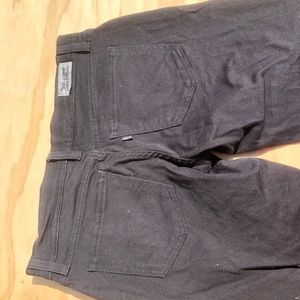 Levi black jeans with silver studs on pockets